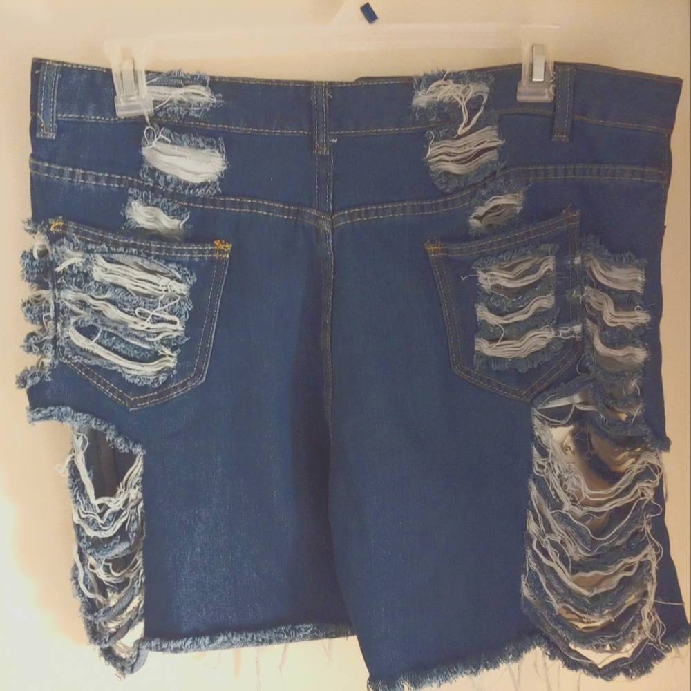 Dark denim distressed short shorts come in size 4XL  Brand Lovelywholesale